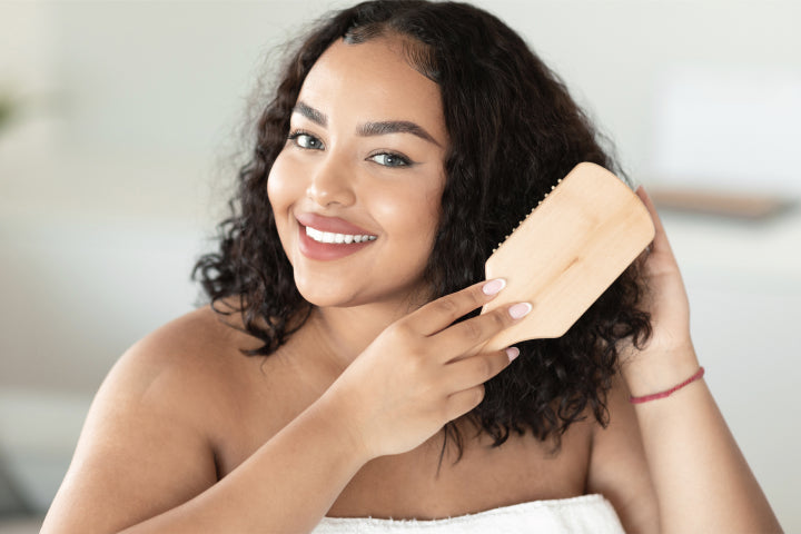 How to Tame Frizzy Curly Hair